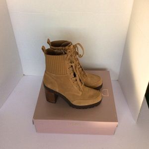 Deltan block heel suede ankle boots.